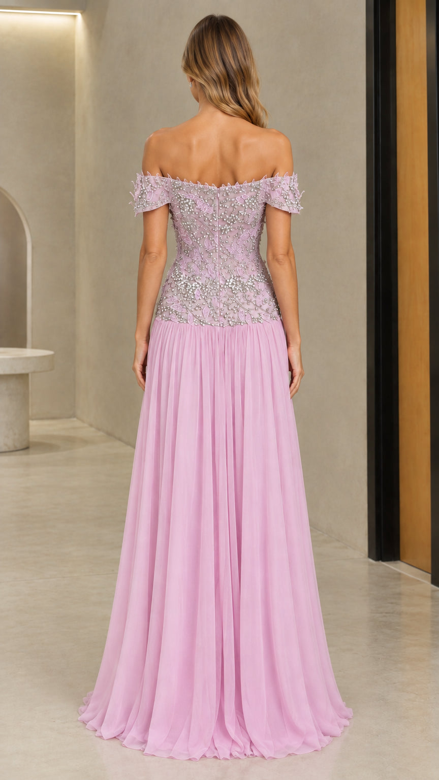 Back view of model showing lilac off-the-shoulder evening dress and pleated skirt