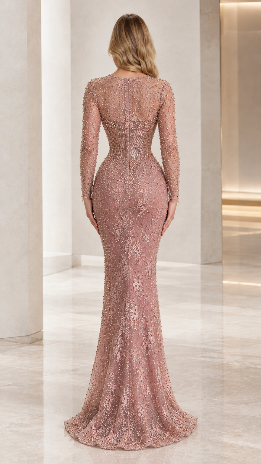 Back view of dusty rose floor-length beaded formal gown
