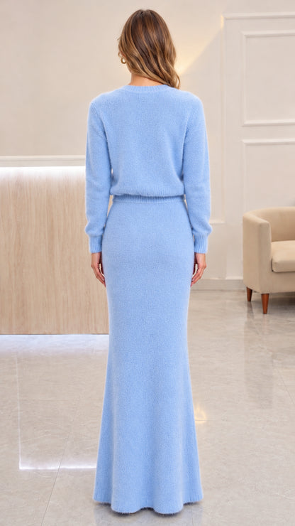 Back view of light blue two-piece fuzzy knit cardigan and maxi skirt outfit