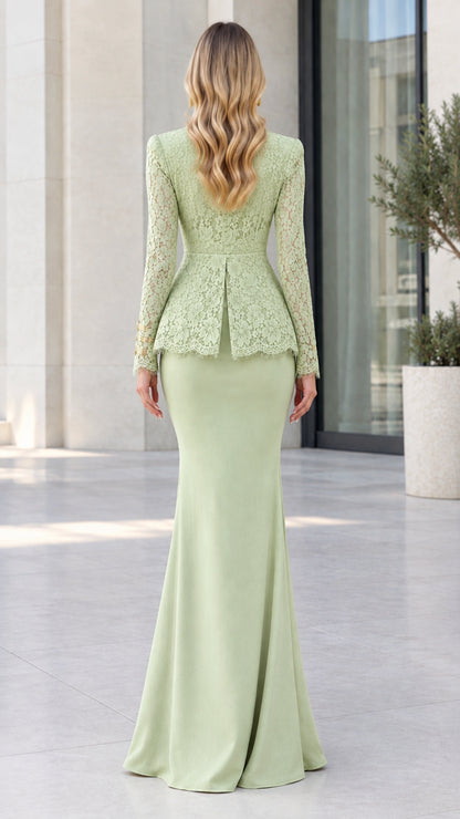 Back view of woman wearing sage green peplum long sleeve gown