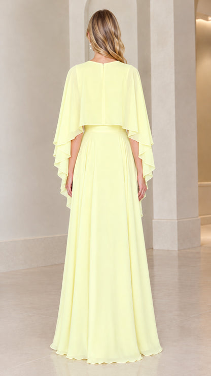 Back view of pale yellow chiffon capelet evening maxi dress showcasing fluid skirt drape