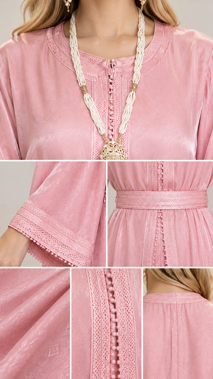 Detailed close-up of embroidery trim, cuffs, fabric texture, and neckline on kaftan dress