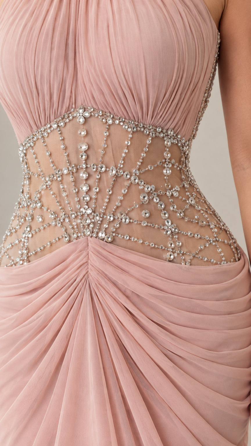 Close-up detail of rhinestone lattice pattern on sheer mesh illusion waist panel
