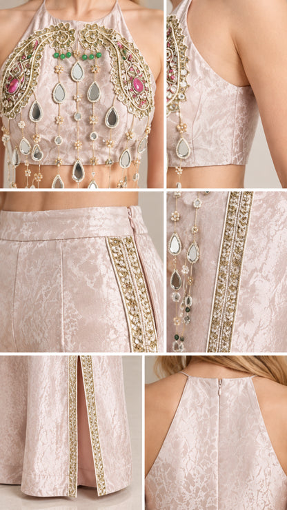 Close-up details of jeweled teardrop fringe, jacquard fabric, and trouser beading