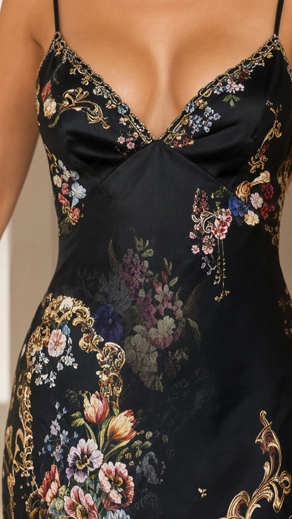 Close-up detail of sweetheart neckline and floral print on satin dress