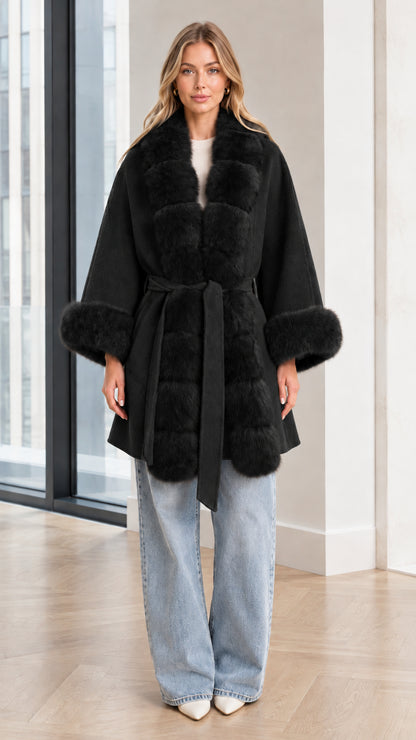 Model wearing Black faux fur trim belted cape coat