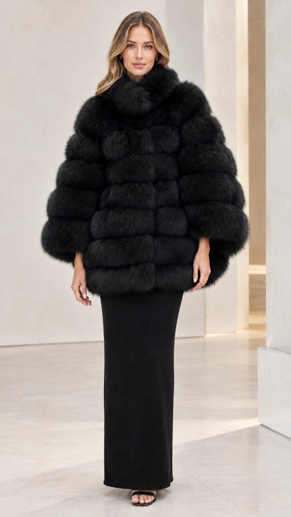 Full front view of black tiered stand collar faux fur cape coat