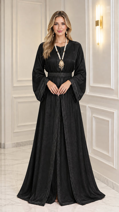 Front view of woman wearing Black satin kaftan maxi dress with belt