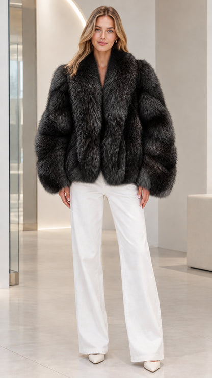 Front view of model wearing Black plush faux fur jacket