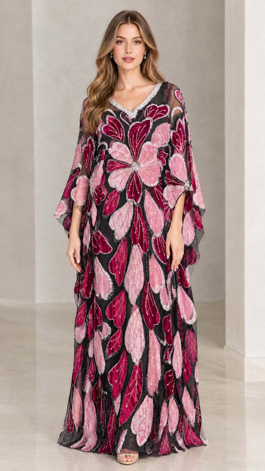 Front view of model wearing black and berry floral embroidered kaftan maxi dress