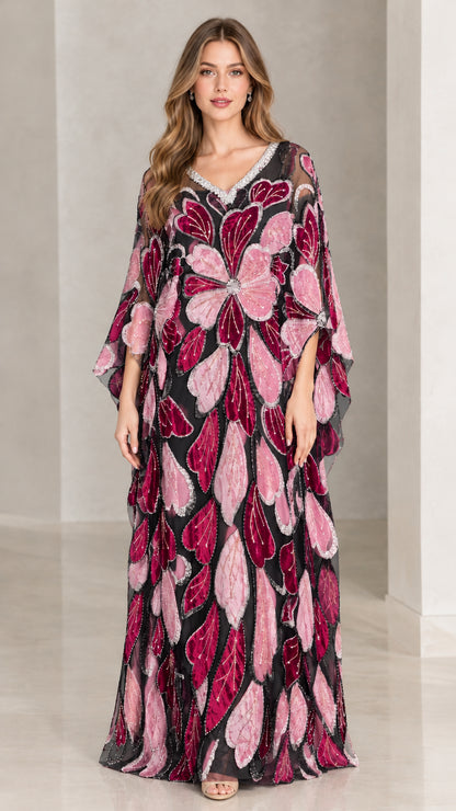 Front view of model wearing black and berry floral embroidered kaftan maxi dress