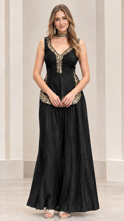Front view of black embroidered sleeveless peplum top and wide palazzo pants set