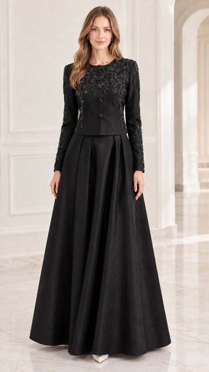 Black long-sleeve beaded formal evening dress on model