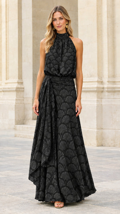 Front view of black halter neck pleated maxi dress with tie waist
