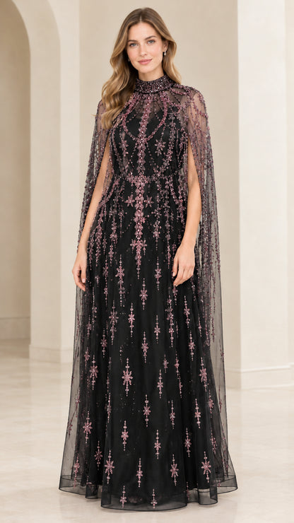 Model wearing Black high-neck beaded formal gown with flowing cape overlay