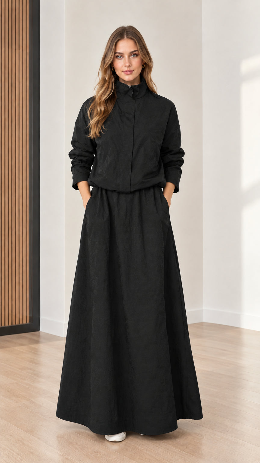 Front view of model wearing Black stand collar long sleeve maxi dress