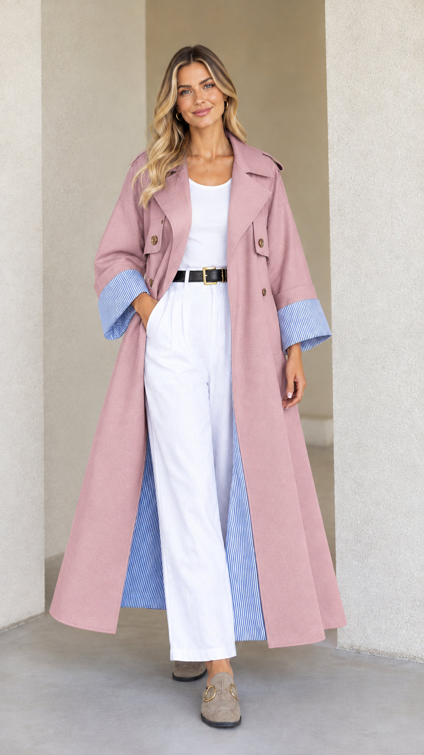 Front view of model wearing Dusty Pink maxi trench duster coat with blue pinstripe cuffs