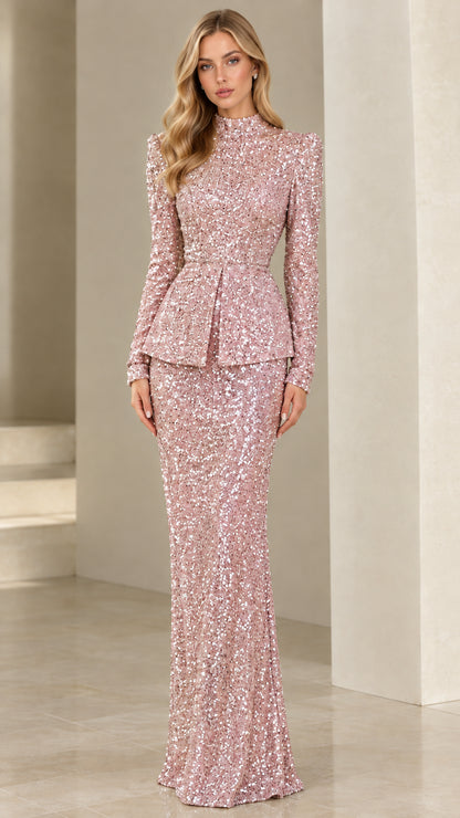 Front view of blush pink long sleeve peplum sequin formal maxi gown