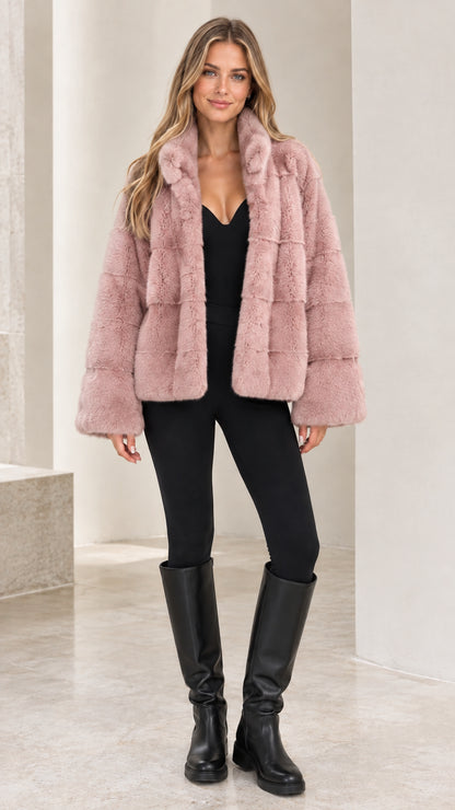 Front view of model wearing Dusty Pink plush faux fur short jacket