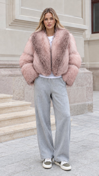 Model wearing Blush Pink cropped faux fur jacket