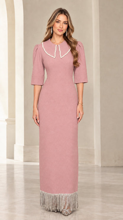Front view of dusty pink pearl collar maxi evening dress with fringe trim