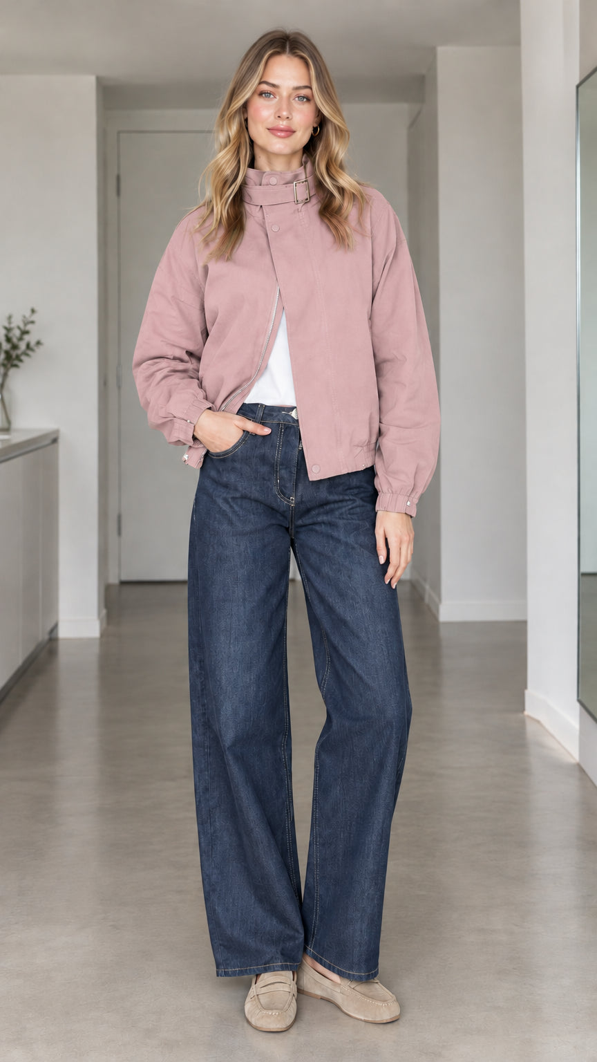 Front view of model wearing dusty pink high-collar buckle bomber jacket