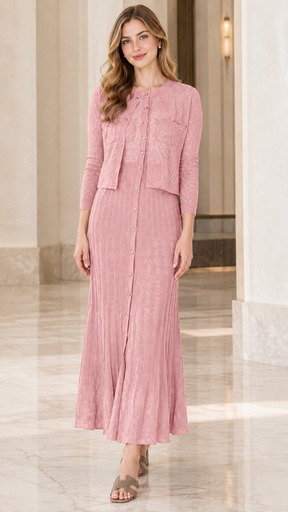 Model wearing dusty pink two-piece textured knit cardigan and maxi dress set