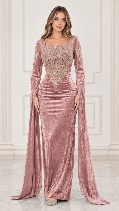 Front view of dusty pink velvet evening gown with intricate bodice embroidery and cape sleeves