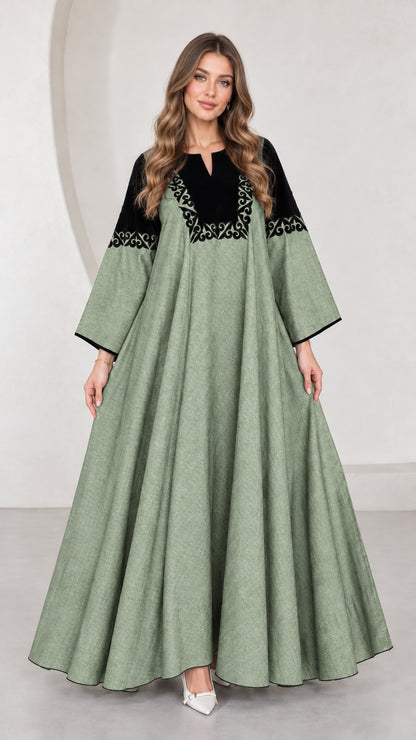 Front view of sage green embroidered contrast yoke maxi dress