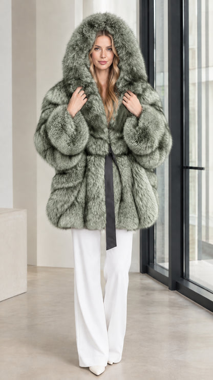 Sage green hooded belted faux fur coat worn with white trousers