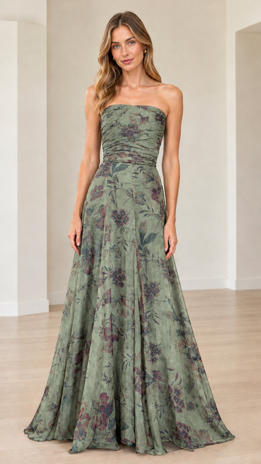 Front view of model wearing sage green floral strapless maxi gown