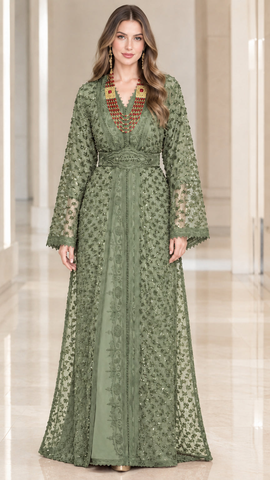 Full-length front view of woman wearing sage green embroidered beaded kaftan maxi dress with belt