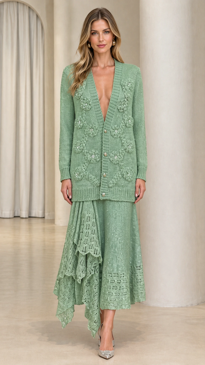 Model wearing sage green button-up knit cardigan and matching lace-trimmed midi skirt set