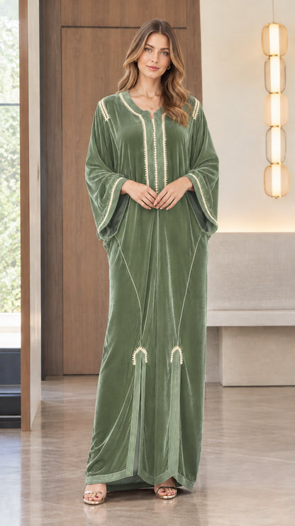 Full front view of model wearing the Sage Green embroidered velvet kaftan maxi dress