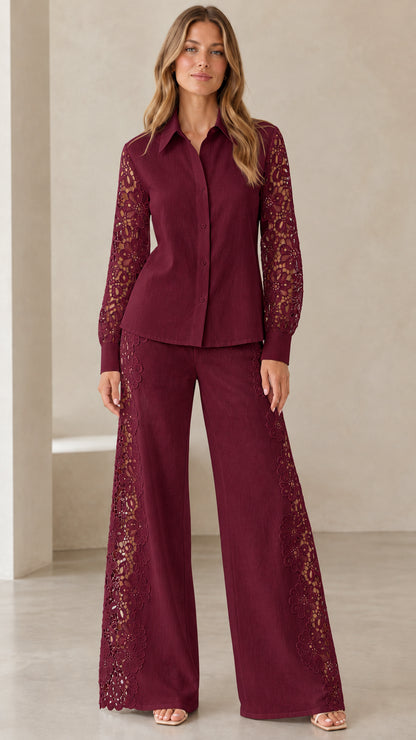 Front view of model wearing burgundy lace-sleeve shirt and matching wide-leg trousers set