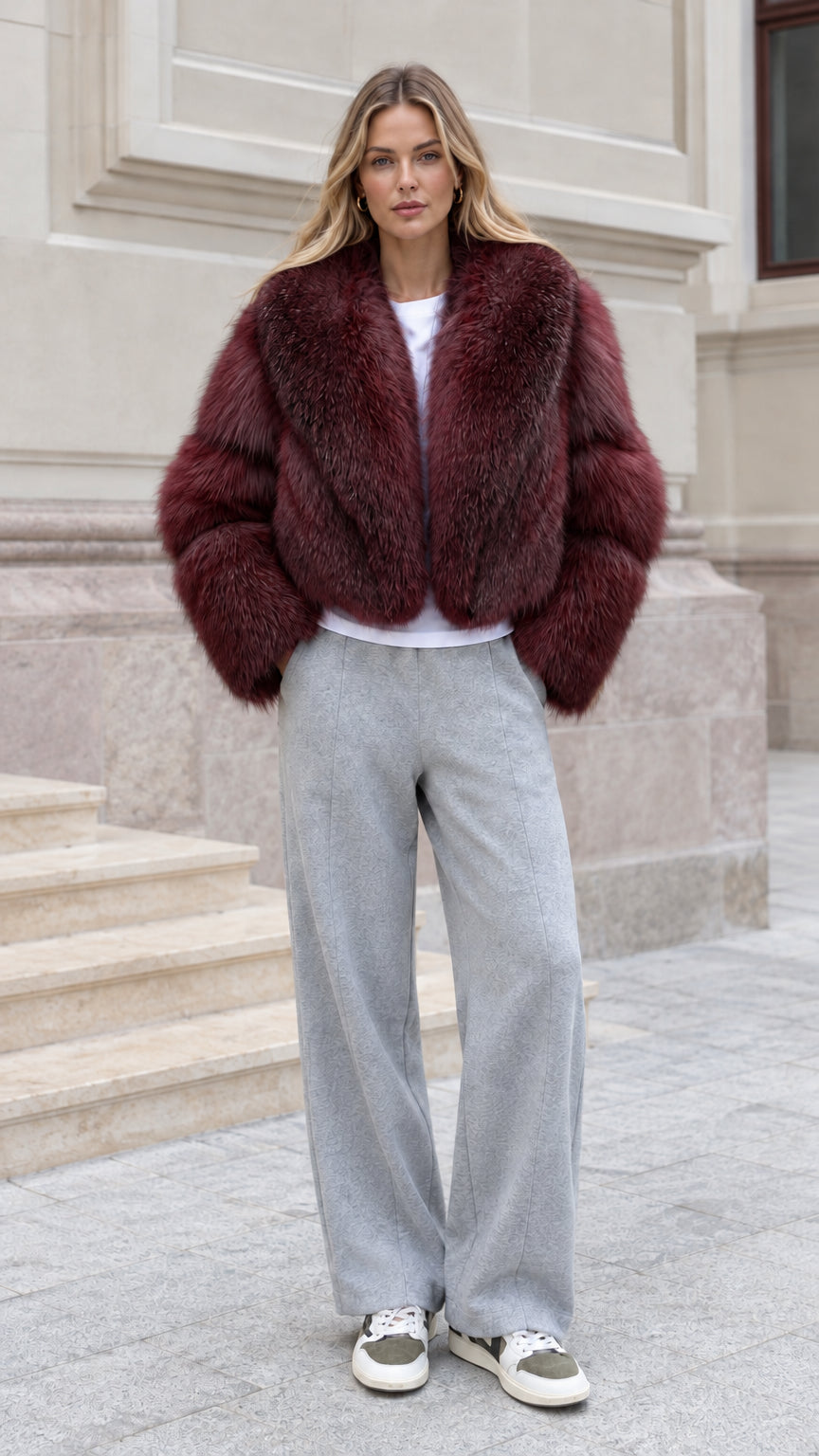 Model wearing Wine Red cropped faux fur jacket