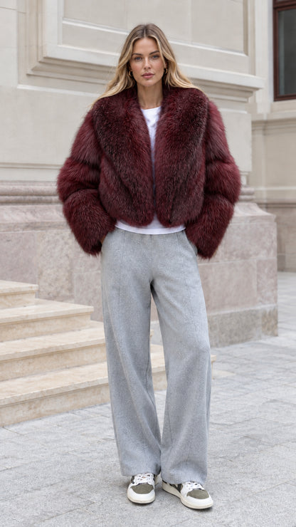 Model wearing Wine Red cropped faux fur jacket
