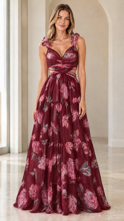 Front view of burgundy floral print sleeveless tiered cutout maxi gown