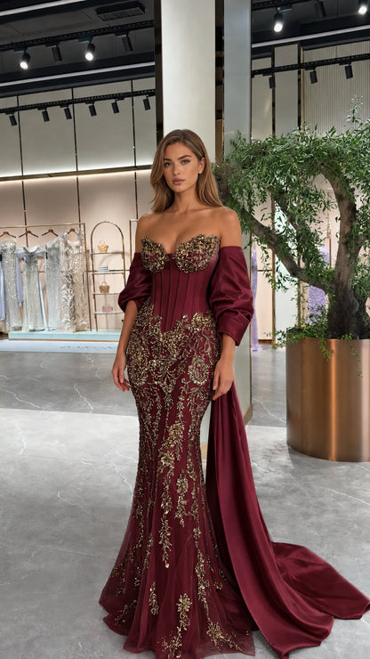 Burgundy sweetheart corset mermaid evening gown with gold embroidery and cape train