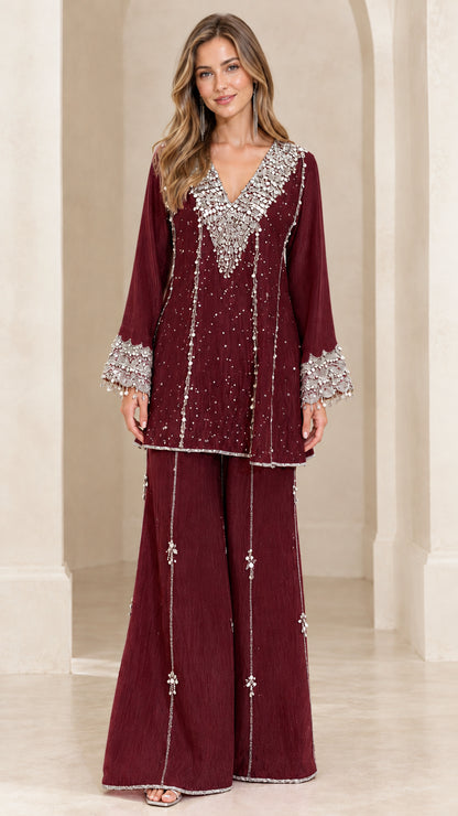 Front view of burgundy wine red embellished tunic and wide-leg pant set