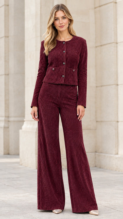 Model wearing burgundy wine ribbed jacket and wide-leg pant set