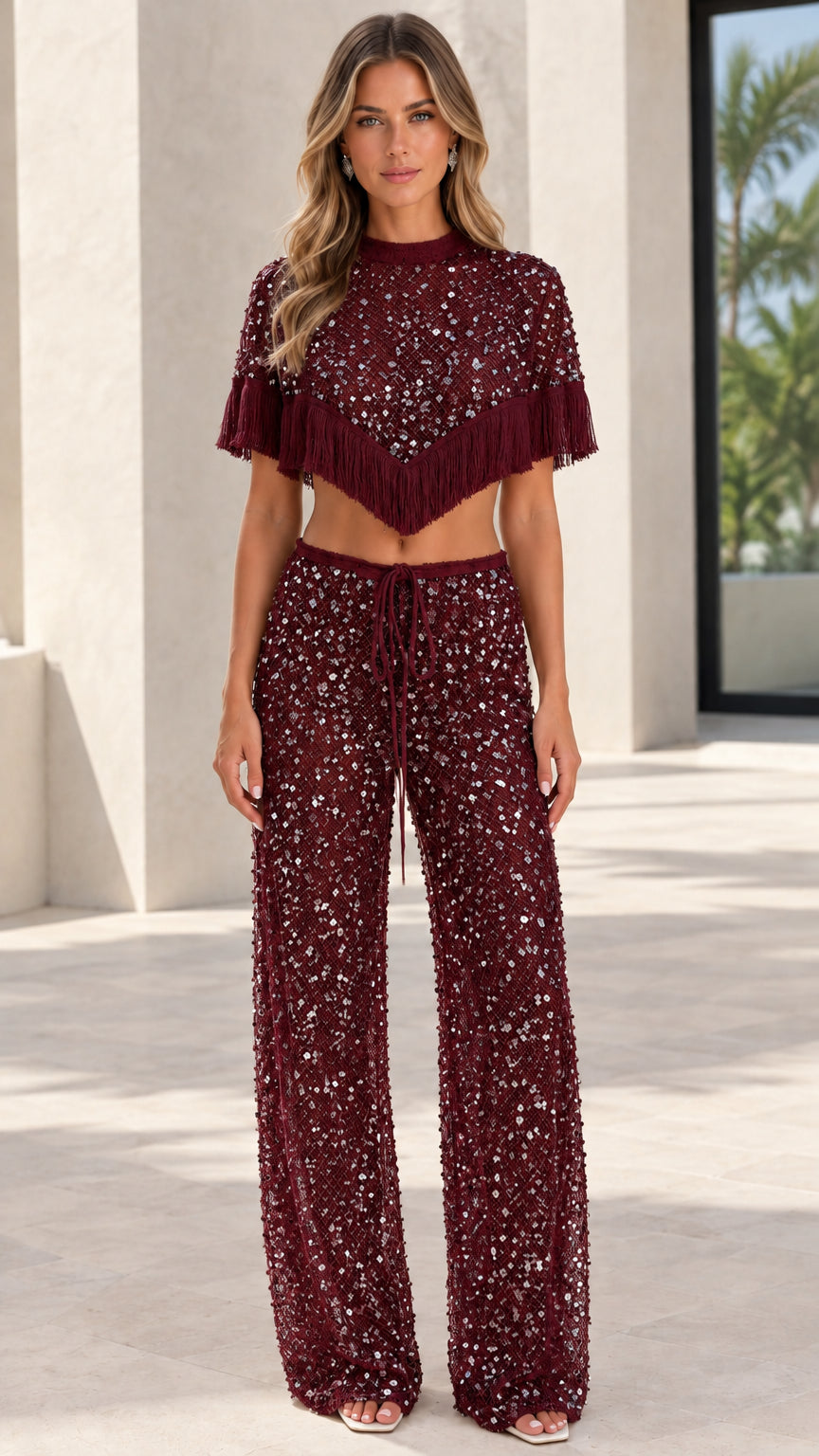 Model wearing Burgundy wine red sequin fringe crop top and wide-leg pants set