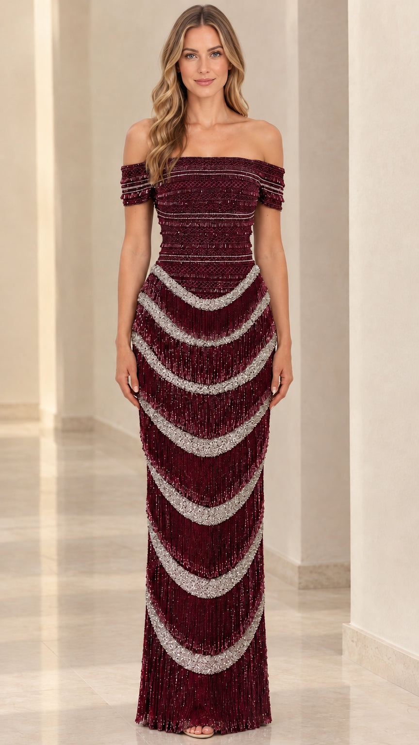 Front view of burgundy off-the-shoulder formal gown with silver beaded accents