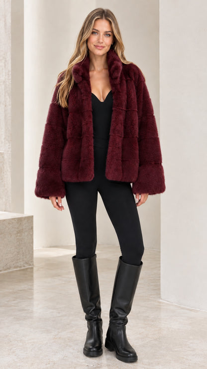 Front view of model wearing Burgundy wine red plush faux fur short jacket