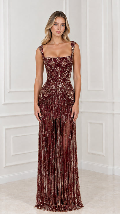 Front view of burgundy wine beaded fringe maxi formal gown