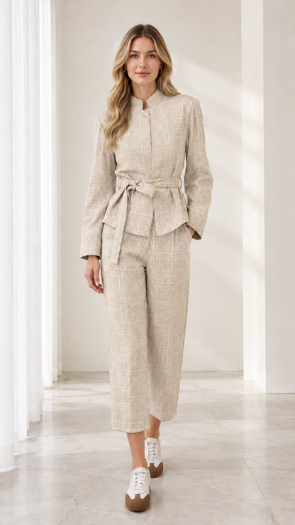 Full front view of model wearing beige oatmeal plaid belted pant suit set