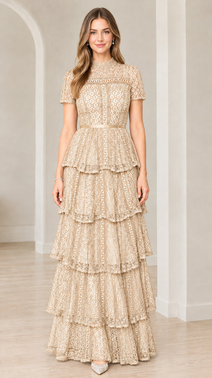 Front view of model wearing Champagne short sleeve tiered lace evening maxi dress