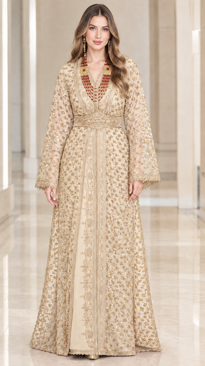 Full-length front view of woman wearing champagne gold embroidered beaded kaftan maxi dress with belt
