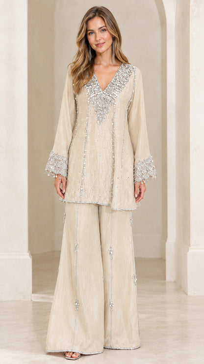 Front view of champagne beige sequin embroidered tunic top and palazzo set