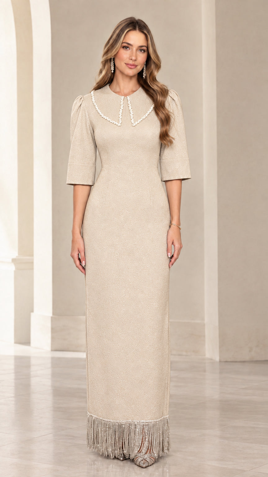Front view of champagne beige beaded collar maxi dress with crystal fringe